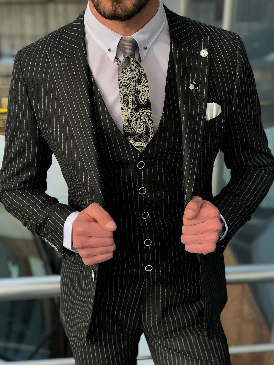 Black Three Piece Pinstripe Suit And Paisley Tie 