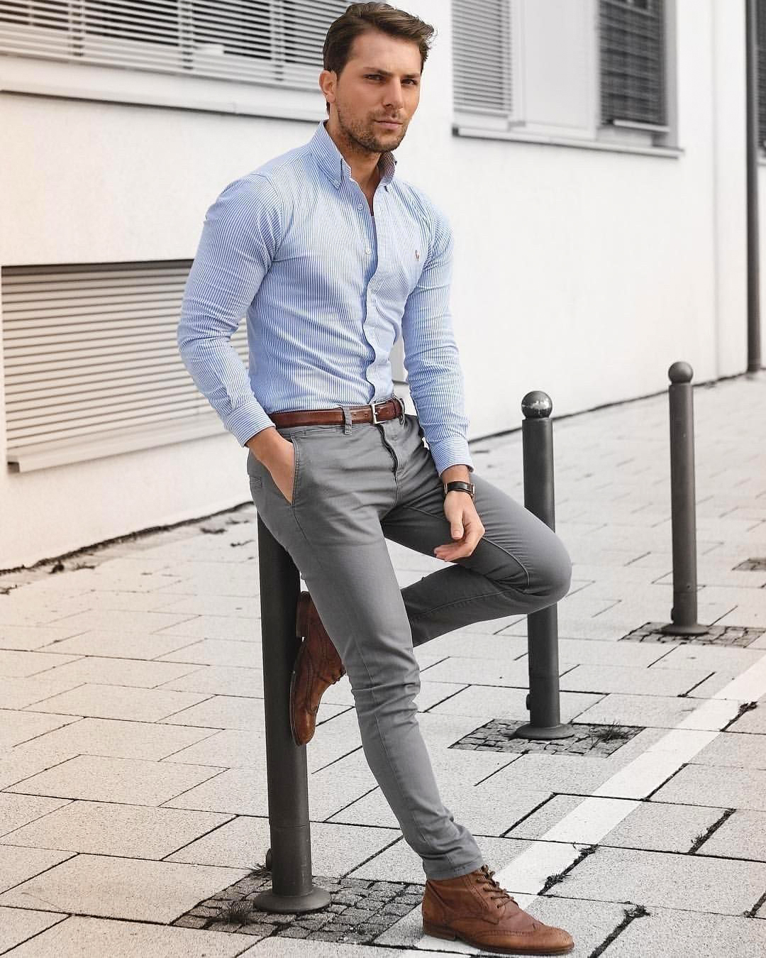 light blue shirt brown shoes and grey pants